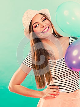 Woman summer joyful girl with colorful balloons