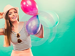 Woman summer joyful girl with colorful balloons