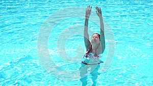 Woman in summer snorkling in the swimming pool