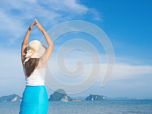 Woman in summer vacation wearing straw hat