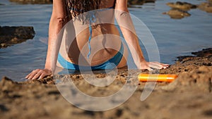 Woman sunbathing