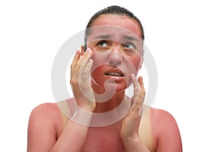 Woman with sunburned skin on white background photo