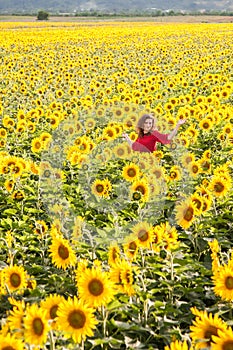 Woman in sunflower field