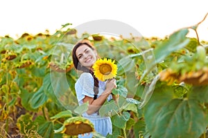 Woman in sunflower field