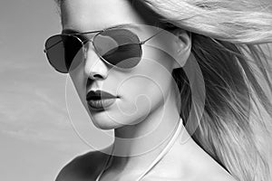 Woman in Sunglasses. Blond Summer Girl