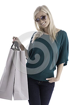Woman with sunglasses and shoppingbags photo