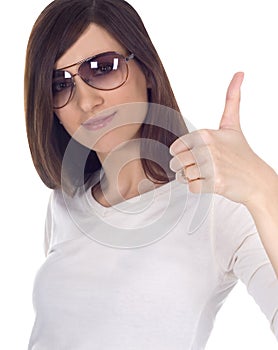 Woman in sunglasses showing ok