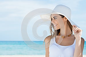 Woman With Sunhat At Beach photo