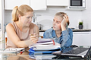 Woman supporting morally her daughter photo