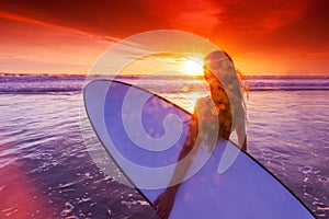 Woman with surfboard