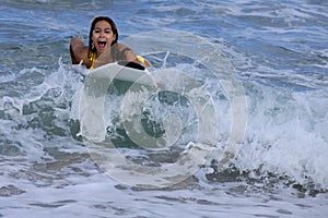 Woman on Surfboard