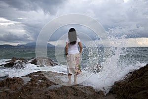 Woman at surfy beach photo