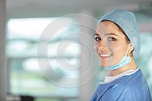 woman surgeon smiling in clinic