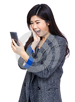 Woman surprise with text message