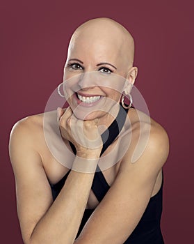 Woman survivor showing bald head