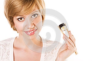 Woman with sushi on a white background. studio