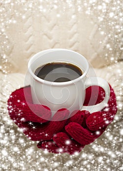 Woman in Sweater with Red Mittens Holding Cup of Coffee
