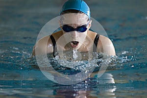 Woman swimming the Breaststroke