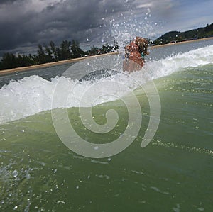 Woman swimming in gloomy sea