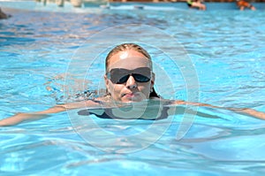 Woman swimming in pool