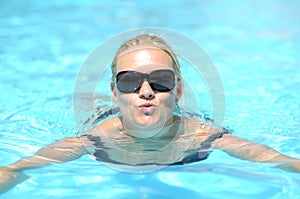 Woman swimming in pool