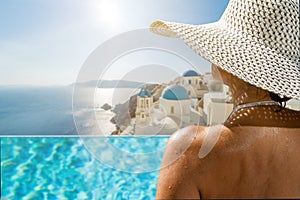 Woman at the swimming pool on the island of Santorini in Greece