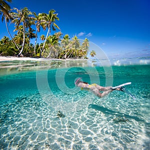 Woman swimming underwater