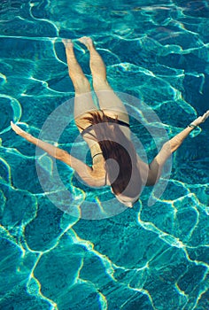 Woman Swimming Underwater