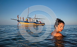 Woman swims in the sea