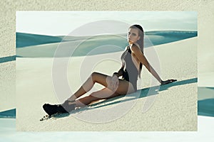 Woman, swimsuit and dune in desert for portrait with edgy style, fashion or grunge in nature with sunshine. Girl, person