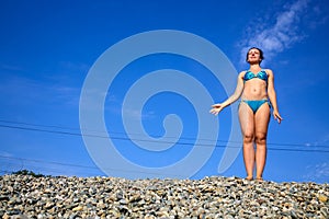 woman in a swimsuit on the railway photo