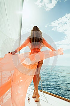 woman in swimwear pareo yacht sea cruise vacation