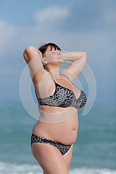 Woman in swimwear at the sea