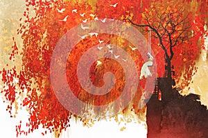Woman on a swing under autumn tree