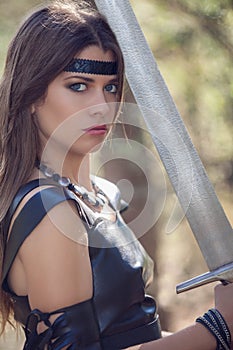 Woman with sword, cosplay photo