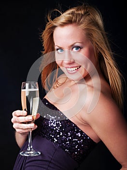 Woman with sylvester champagne photo