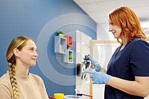 A woman with symptoms of dizziness is seen by a neurologist. The doctor explains to the patient about the structure of the inner