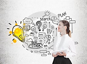 Woman with tablet, business idea and light bulb