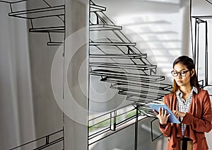 woman with tablet designing the office stair with lines where it going to be