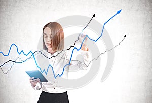 Woman with tablet draws growing graph