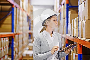 Woman, tablet and taking inventory in logistics warehouse for package distribution, delivery and stock. Female inspector
