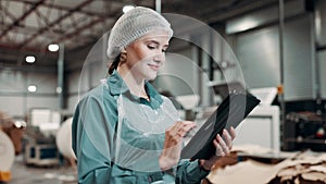 Woman, tablet and warehouse for freight, checklist and ecommerce with wholesale supplier. Inspector, hairnet and digital