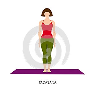 Woman in Tadasana or Mountain yoga pose. photo