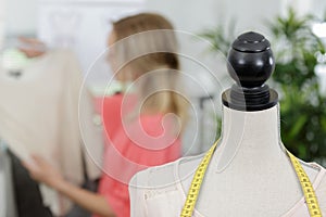 woman and tailors office