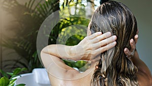 woman take a bath and washing hair