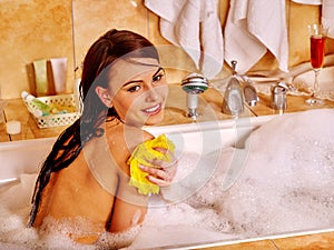 Woman take bubble bath