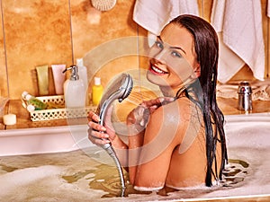 Woman take bubble bath