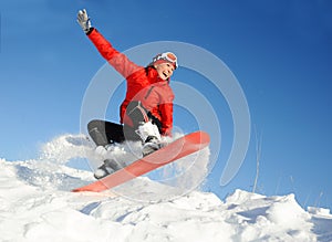 Woman take fun on the snowboard