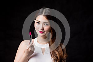 Woman take lipstick