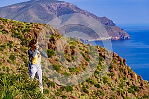 Woman take photo, Park Cabo de Gata, Spain photo